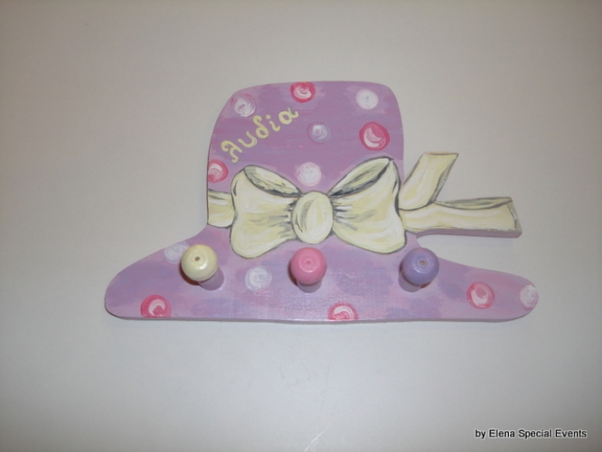Hand-painted wooden hanger “hat”.