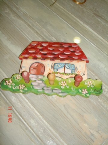 Hand-painted wooden hanger “house”.