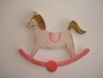 Hand-painted wooden hanger “carousel”.