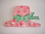 Hand-painted wooden hanger “hat”.