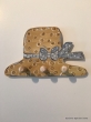 Hand-painted wooden hanger “hat”.