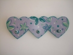 Hand-painted wooden hanger “3 hearts”.