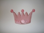 Hand-painted wooden hanger “crown”.